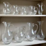 Antique Lead Crystal Pitchers in a Collection