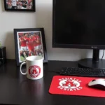 Besiktas-themed desk setup with a mug, mousepad, and framed photo