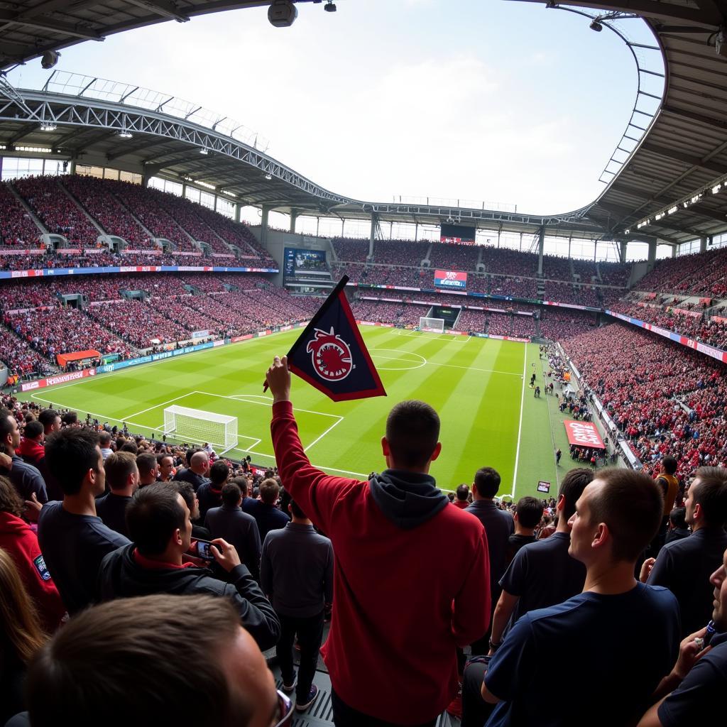 Besiktas fan holding an Mn Twins Pennant at Vodafone Park