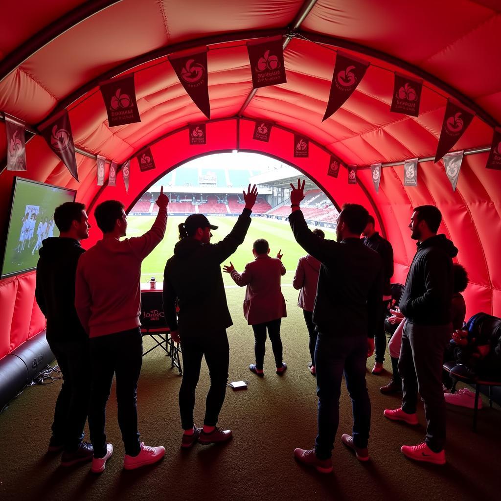 Besiktas Fans Celebrating a Goal Inside Their Tailgate Tent