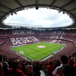 Besiktas fans creating a massive tifo display in the stadium stands