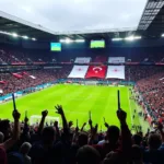 Besiktas fans waving flags and banners in the stadium