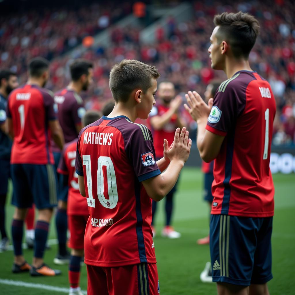 Beşiktaş players applaud Mathews, who is visibly emotional in the stands