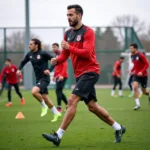 Besiktas players training intensely on the pitch