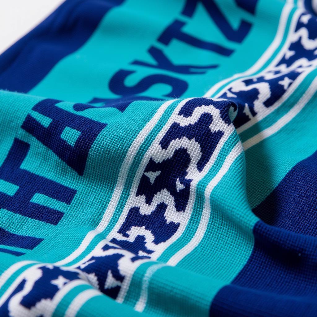 Besiktas scarf with intricate blue and teal patterns