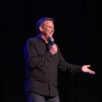 Charlie Berens performing on stage in Kansas City