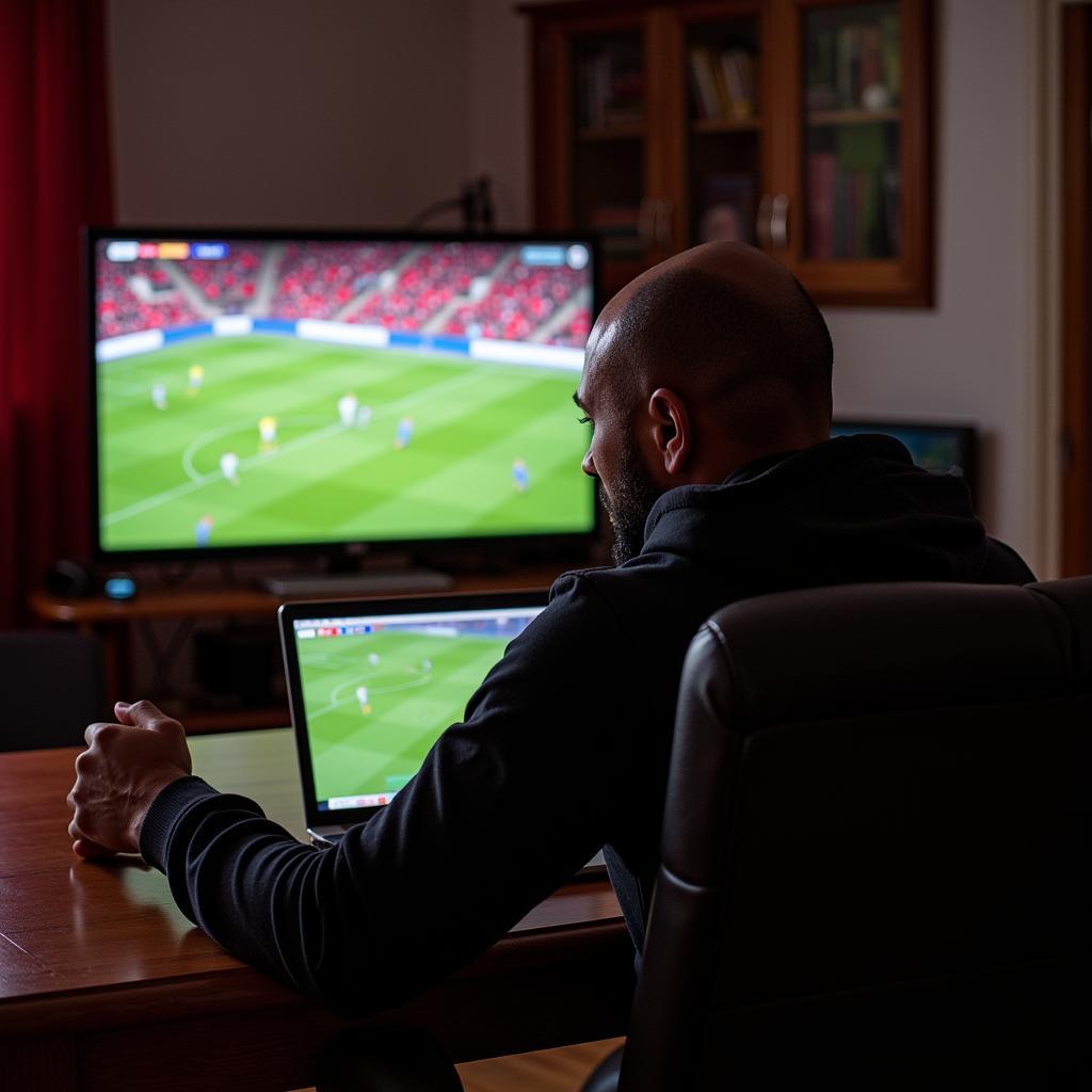 Derrick Manning watching a Besiktas match at home in Ada