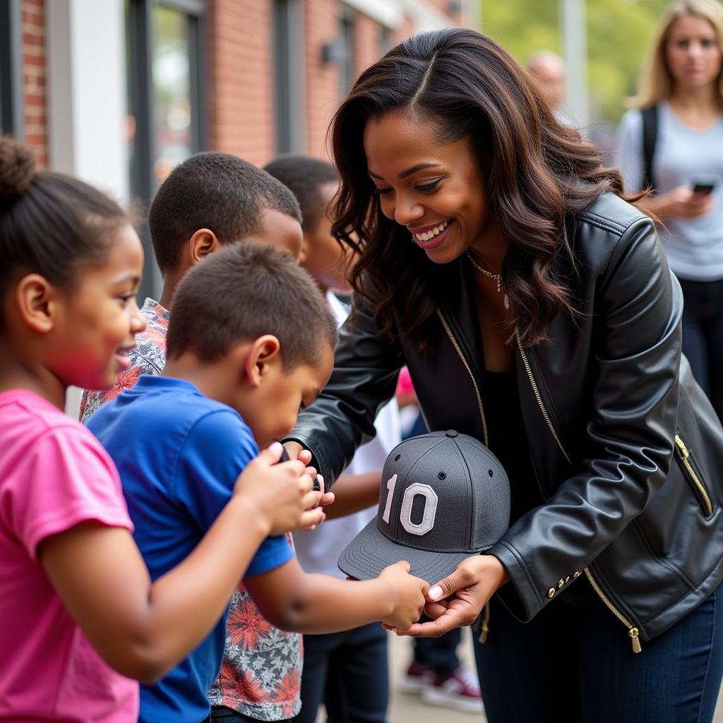 Diamond Jackson signs autographs for young fans