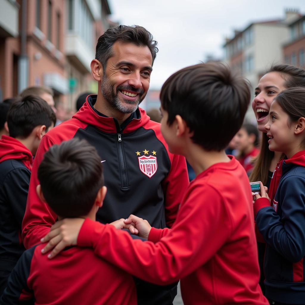 Eros Leo takes time to greet young Beşiktaş fans, signing autographs and sharing smiles.