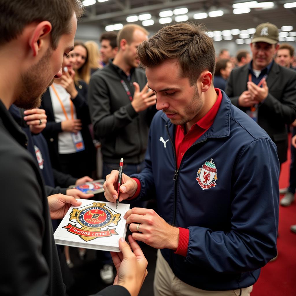 JJ McCarthy signing autographs for fans