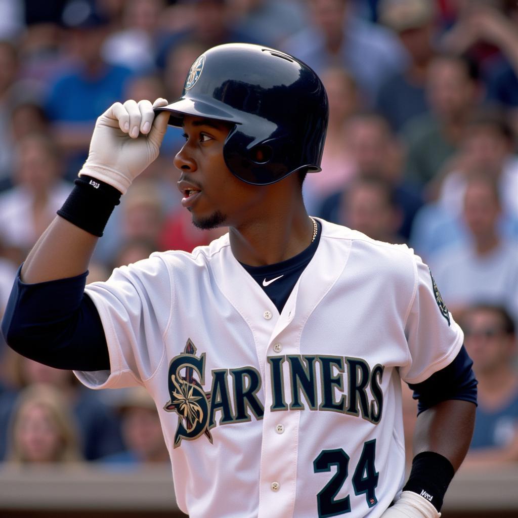 Ken Griffey Jr. swinging in his Seattle Mariners jersey