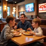 Children enjoying free meals at a restaurant in Houston on a Thursday