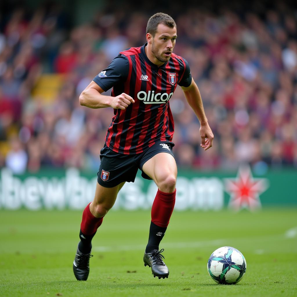 Scottish footballer Lindsay Auld in action