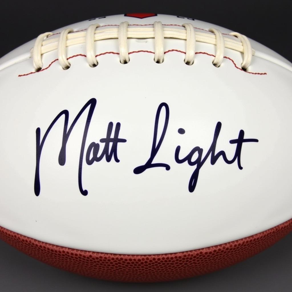 Matt Light Autographed Football