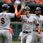 Miami Marlins players celebrating a victory at loanDepot park