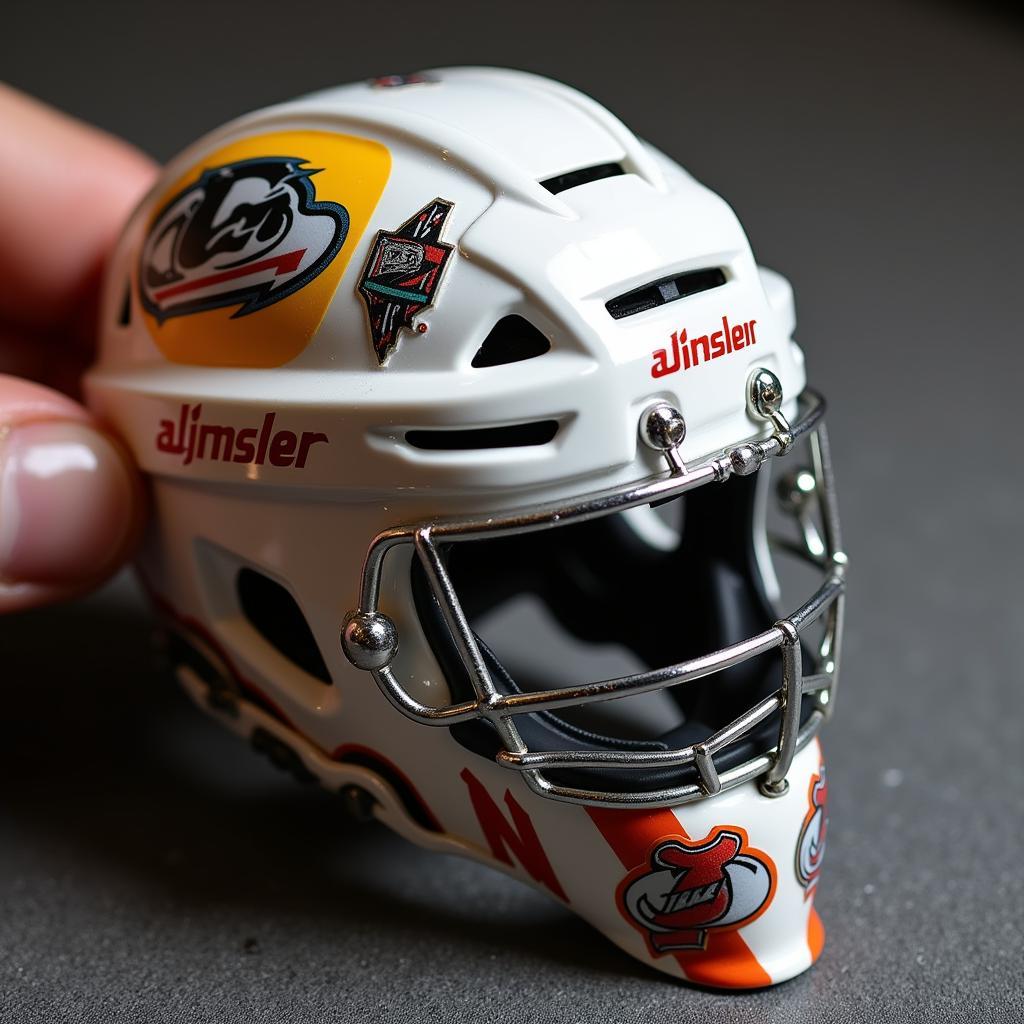 A close-up shot of a miniature hockey helmet, showcasing its intricate details