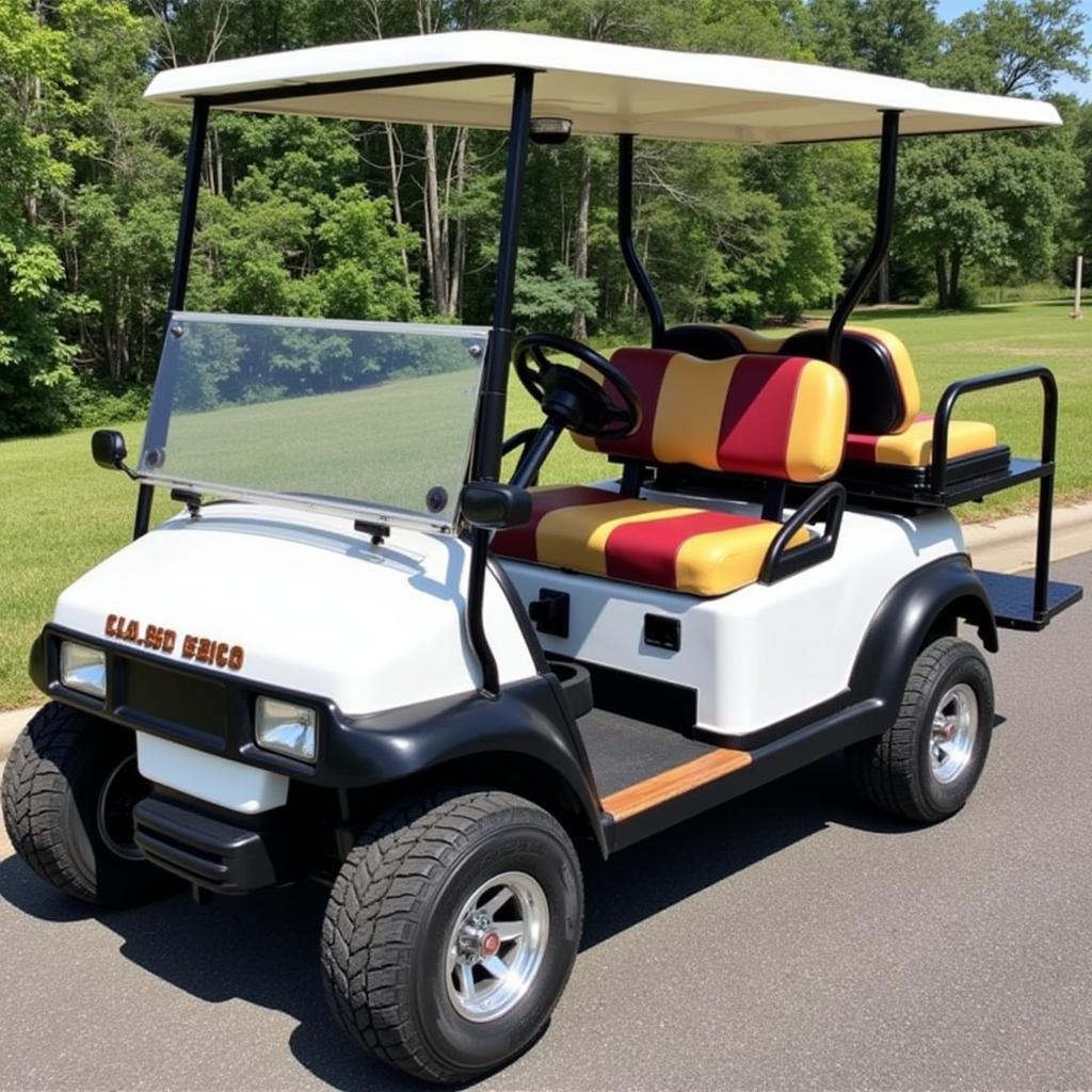  A fully restored 1985 Club Car golf cart with modern upgrades