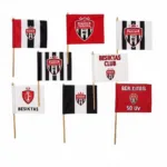 Small garden flag holders displaying various Besiktas flags.