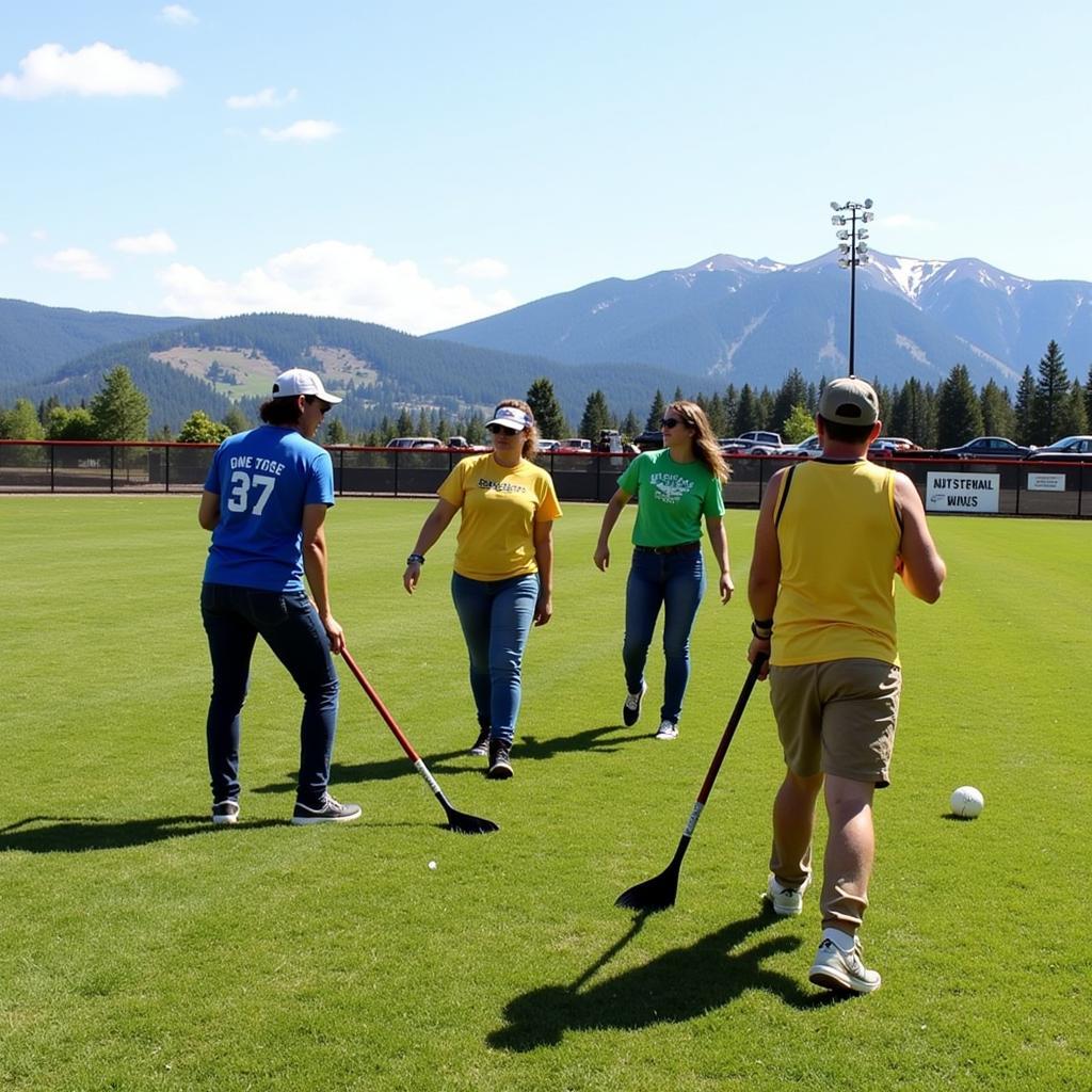 Spokane South Little League parent volunteers preparing the field