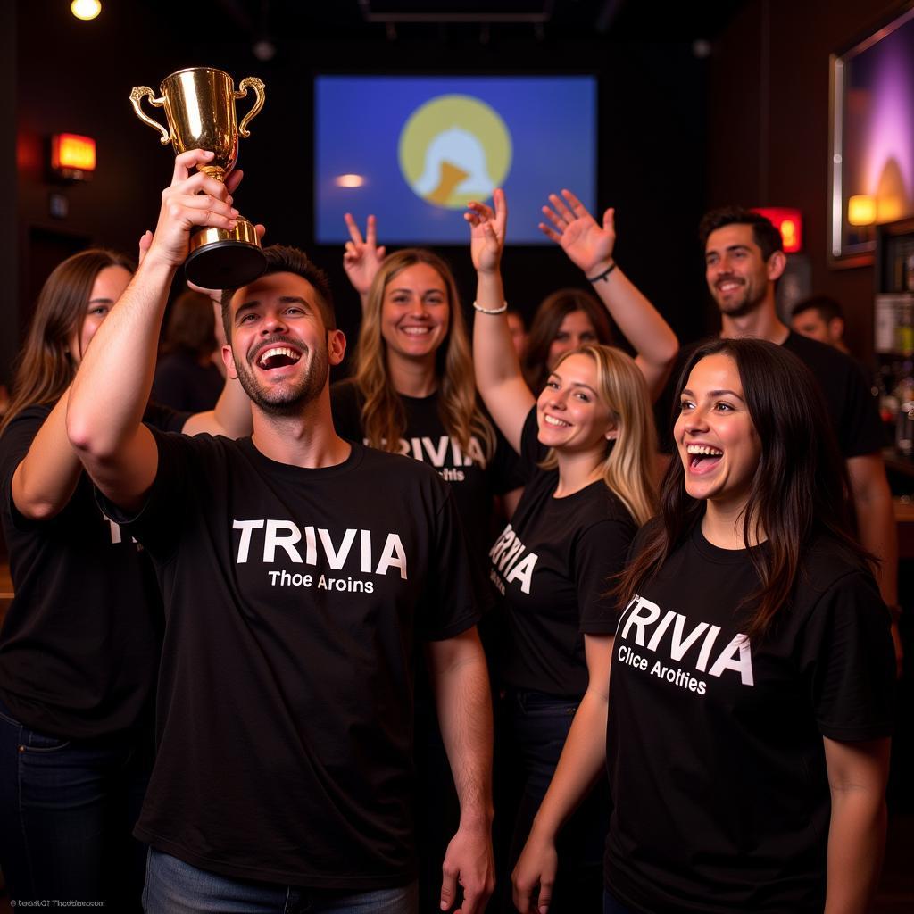 Victorious trivia team holding up their trophy with pride