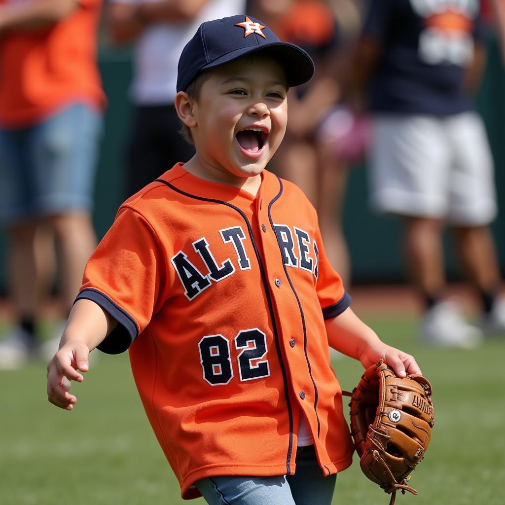 Young fan sporting an Alvarez Astros jersey