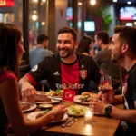 Besiktas fan celebrating a victory with a steak dinner at Cowboy Star