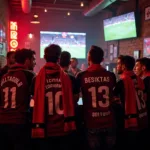 Besiktas Fans Watching a Match at a Bar