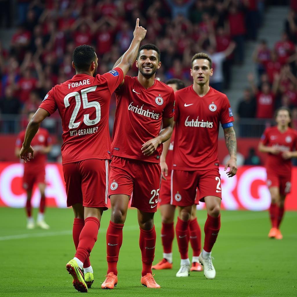 Besiktas Player Wearing GB 25 Celebrates a Goal with Teammates