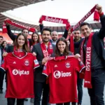 Discount Besiktas Gear: Fans showing off their jerseys and scarves