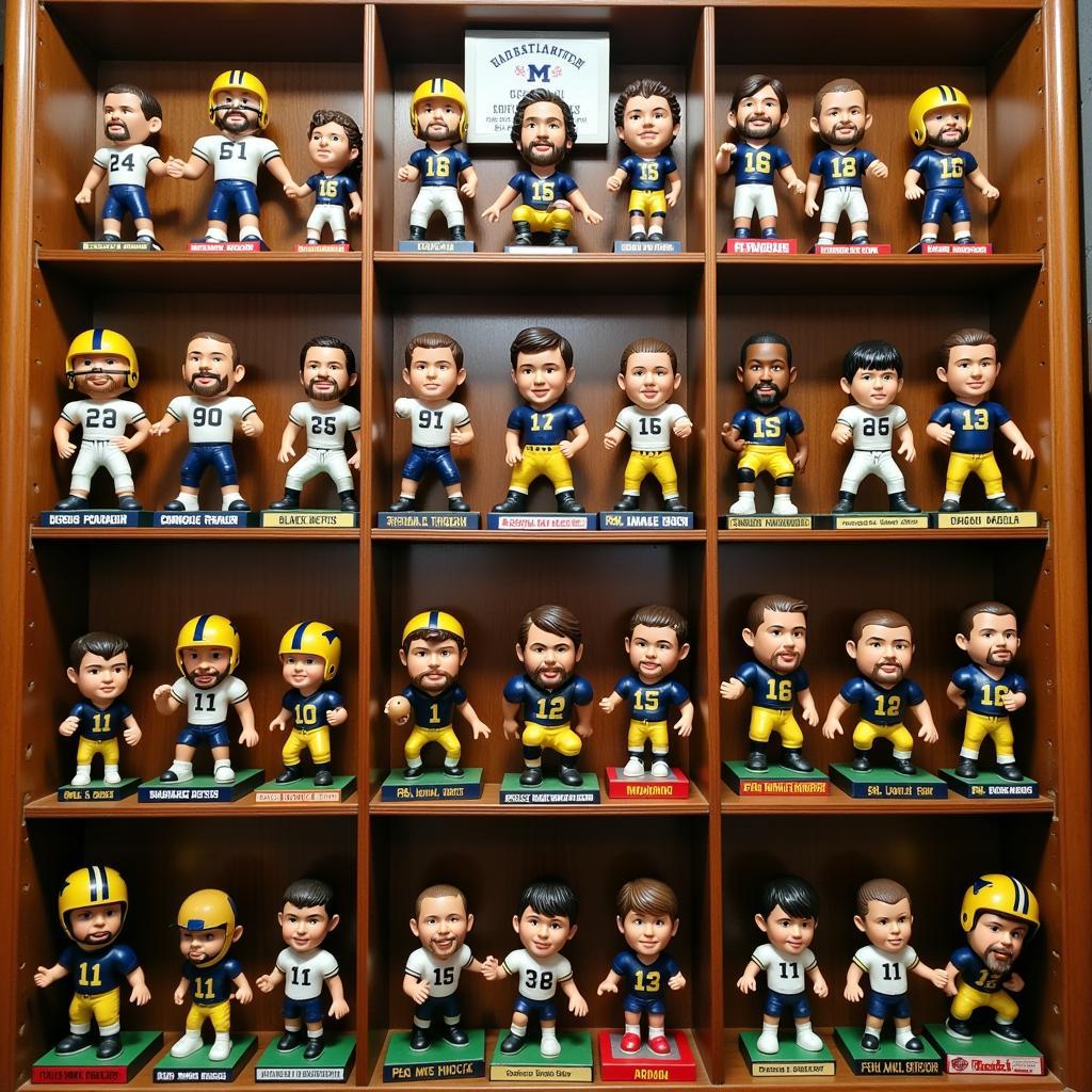 A dedicated display case showcasing Michigan football bobbleheads.