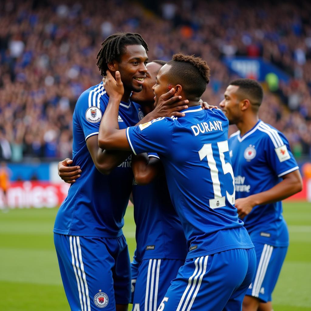 Johan Durant celebrates scoring a goal with his teammates.