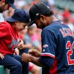 Ronald Acuna Signing a Jersey for a Fan