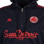 Close-up view of Sana Detroit hoodie design and emblem